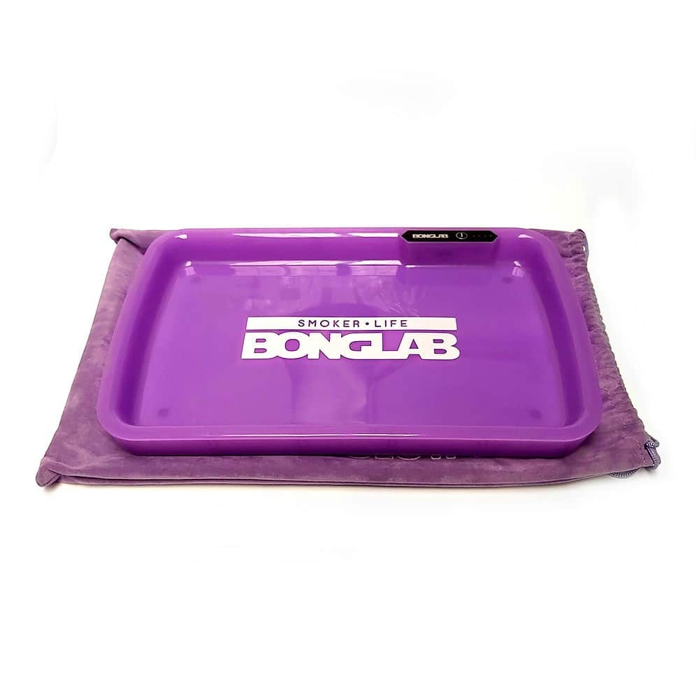 La Neon Tray Bandeja Enrolado LED Morada añade un toque vibrante a tus sesiones, proporcionando iluminación atractiva mientras te ayuda a mantener todo organizado durante el proceso.